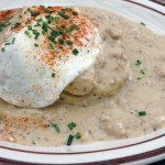 The Moneyball - Biscuit and gravy topped with egg over easy