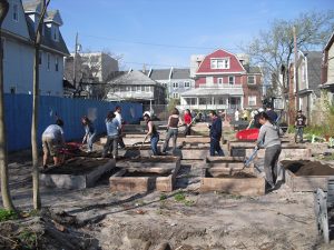 The community was eager to help with the topsoil delivery (May 2011)