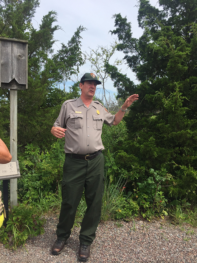Park Ranger speaking about the Bat structures built in the wildlife preserve JPG
