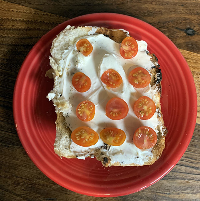 simple sliced tomatoes with cream chease on toasted bread with salt and pepper (1)