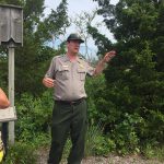 Park Ranger speaking about the Bat structures built in the wildlife preserve JPG